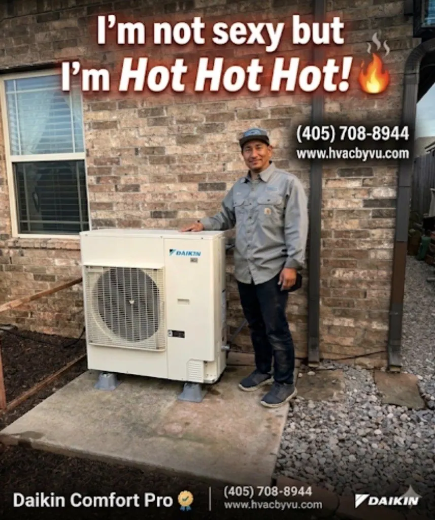 Technician standing beside a Daikin Comfort Pro outdoor unit against a brick home exterior